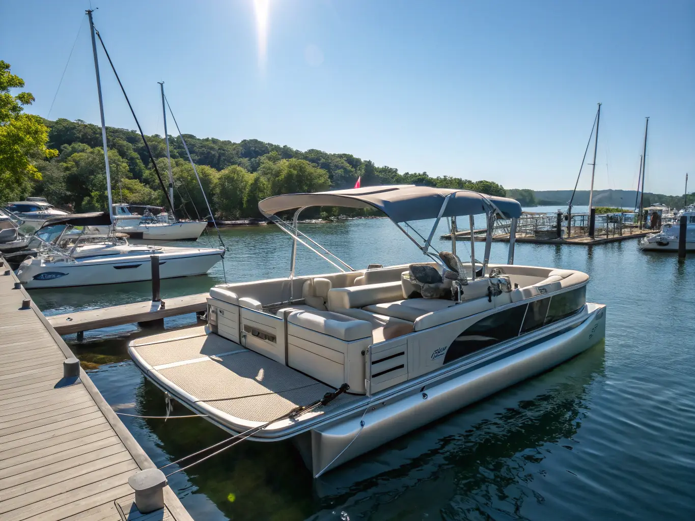 A picturesque anchorage in Bequia, with LaGloria catamaran in the foreground and lush green hills in the background, showcasing the serene beauty of the Grenadines.